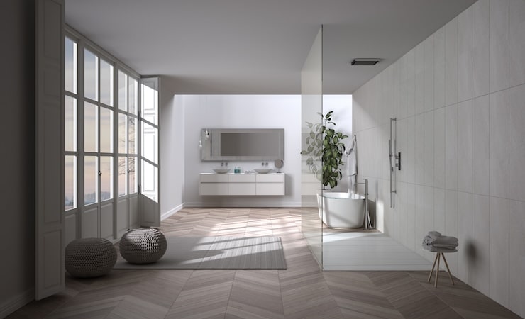 Salle de bain avec une association de parquet et carrelage.