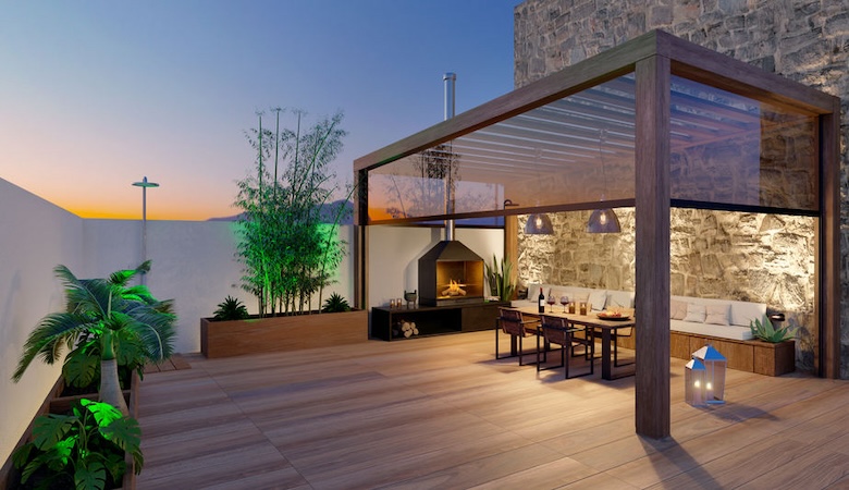 Une pergola bioclimatique dans une terrasse de maison.