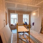 material for repairs in an apartment is under construction, remodeling, rebuilding and renovation. making walls from gypsum plasterboard or drywall.